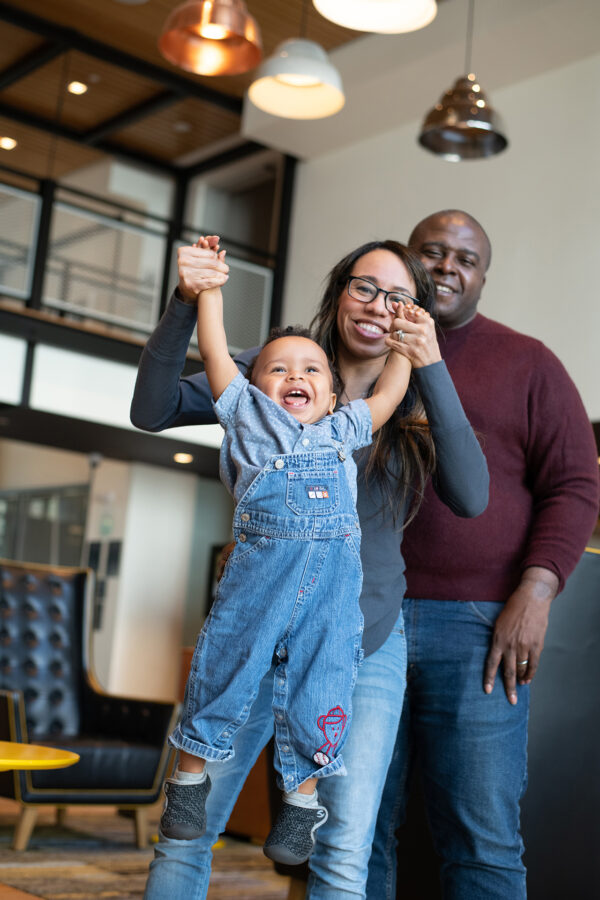 Happy baby with mom and dad